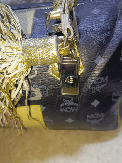 MCM Visetos Princess Lion Boston Bag – Black/Gold | Pre-Loved