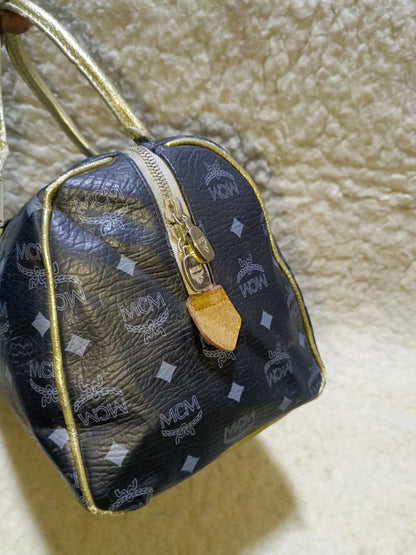 MCM Visetos Princess Lion Boston Bag – Black/Gold | Pre-Loved