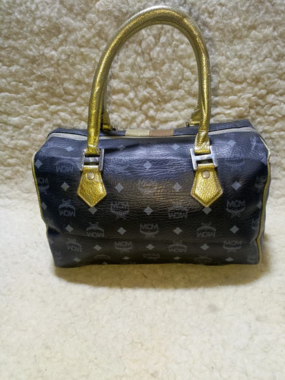 MCM Visetos Princess Lion Boston Bag – Black/Gold | Pre-Loved