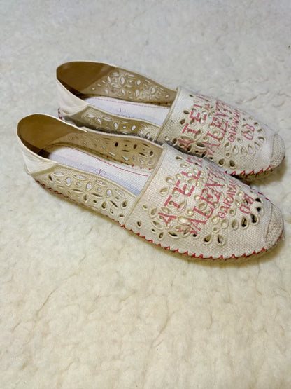 Valentino Flats with Red Logo Print – Size EU 39 | Pre-Loved