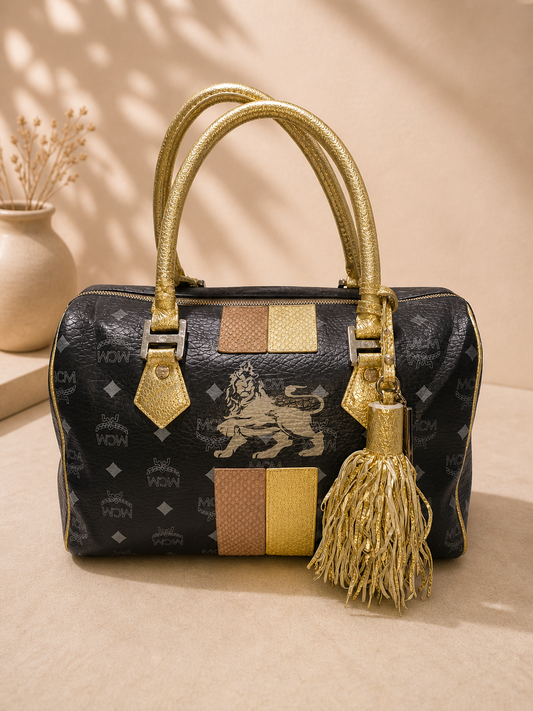 MCM Visetos Princess Lion Boston Bag – Black/Gold | Pre-Loved